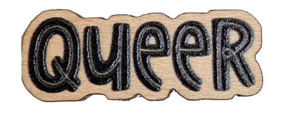 Queer wooden pin badge